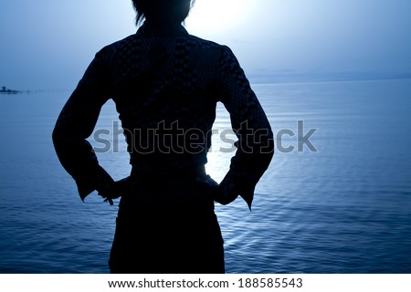 Woman at the lakeside