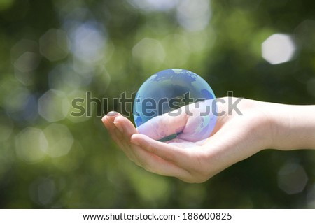 Hand holding Globe, Eco concept