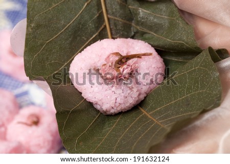 Japanese bean paste rice cake wrapped in a cherry leaf
