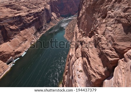 I look down the Colorado River from Grand Canyon bridge