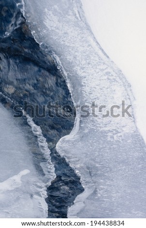 Brooks Hirayu flowing under the ice and snow