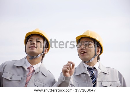Business Man Of 2 People Visit The Work Site