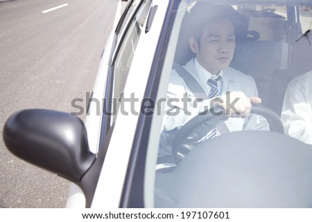 Business Man Driving A Car