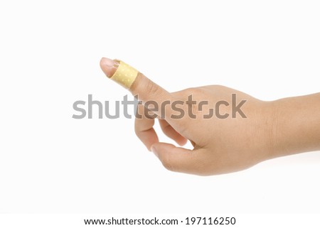 A Child\'S Finger Wrapped Around With A Band Aid