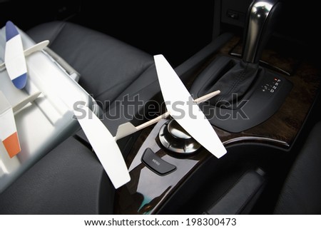 A Car And A Paper Airplane