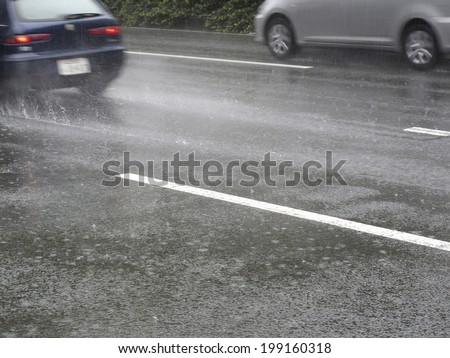 Splashes From The Car Driving In Rain