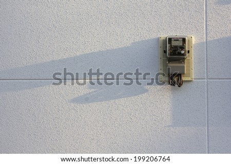 Power Consumption Meter On The Wall Of The House