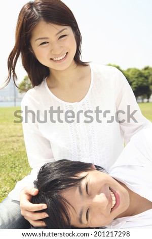 rest his head on his girlfriend\'s lap