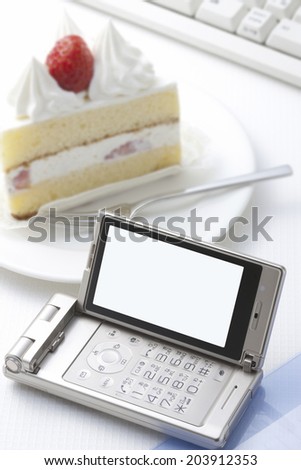 Mobile Phone And Short Cake