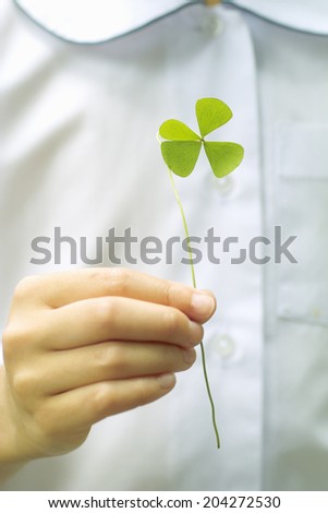 The Woman With A Four-Leaf Clover