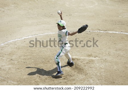 A Boy Baseball Pitcher