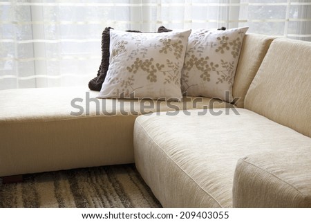 The Sofa Near The Window In The Living Room