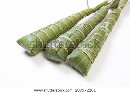 Steamed Rice Cake Rolled With Bamboo Leaves