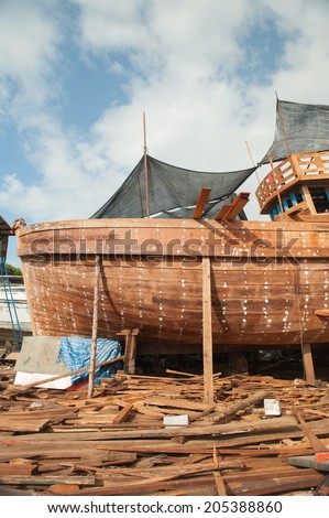Shipyards and ship building and repairing wooden boats painted.