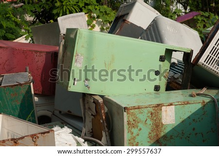 Suratthani,Thailand, July 24,2015:Old refrigerator that is broken or breaking the pile at the plant waste for recycling.