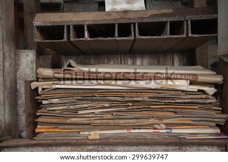Suratthani,Thailand, July 24,2015:Paper box old, broken or not in use at the plant waste be recycled to minimize waste and the environment