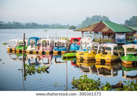 Suratthani,Thailand, July 27,2015:Kayaks and water bikes available to ride in the lake for exercise and recreation.