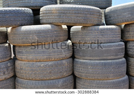 Old car tires awaiting recycling.