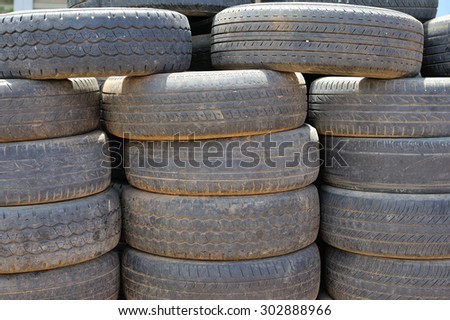 Old car tires awaiting recycling.