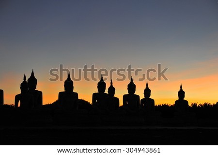 Buddha silhouette at dusk sunset.