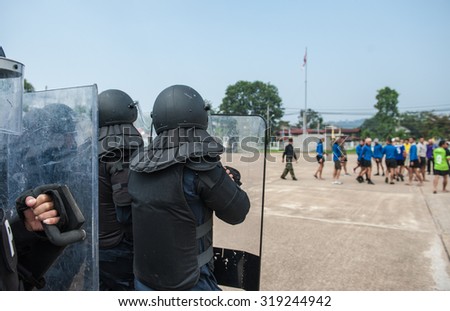 Riot police used shields and batons tactical training.