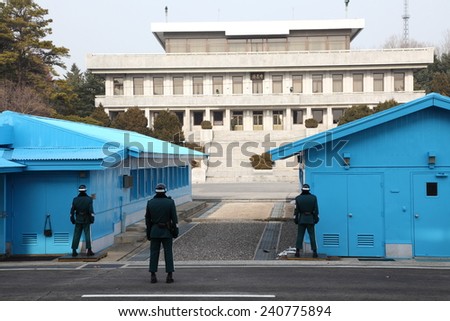PANMUNJOM, SOUTH KOREA - FEB 28: Korean soldiers in the Joint Security Area on FEB 28, 2014 in Panmunjom, South Korea. The armistice agreement was signed in 1953 which divided Korea in two parts
