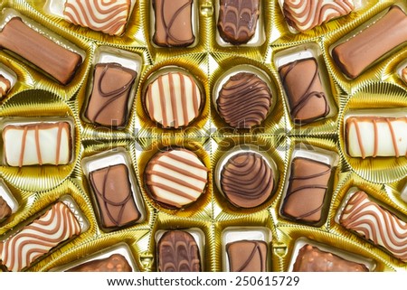 Large box of sweet chocolate candies.