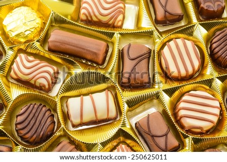 Large box of sweet chocolate candies.