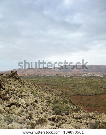 Northern Fuerteventura, Canary Islands, view south from Montana de Arena, rock formations covered with lichens