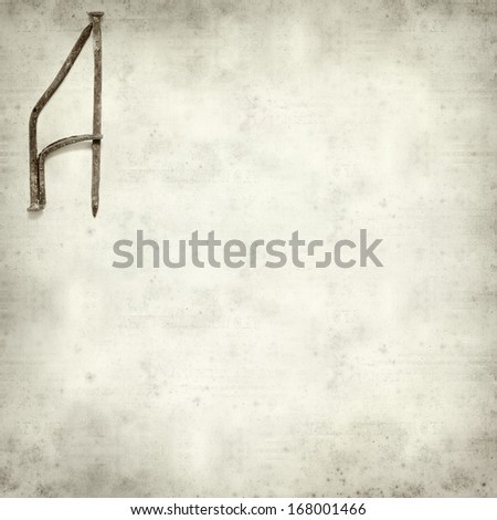 textured old paper background with old forged nails