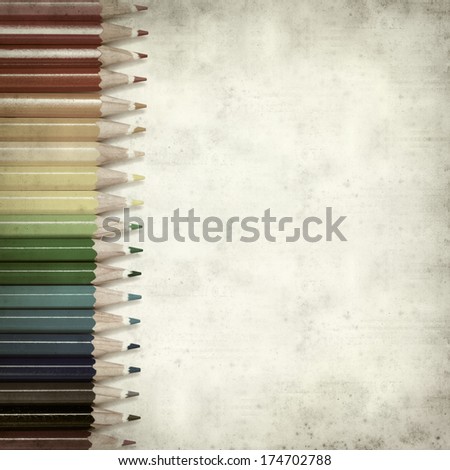 textured old paper background with color pencils