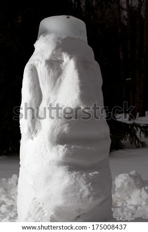 snow Moai - snowman made in shape of Easter island  monolithic human figures