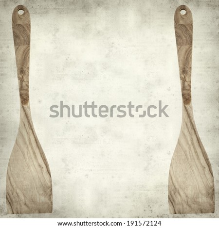 textured old paper background with wooden spatula