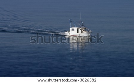 small fishing boat, calm sea