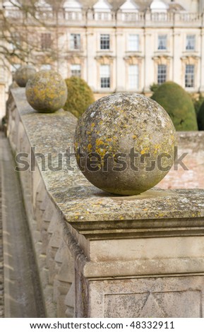 decorative stone spheres on the bridge parapet in Clare college, Cambridge, England, Uk