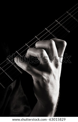 Major seventh chord (Amaj7) on electric guitar; toned monochrome image