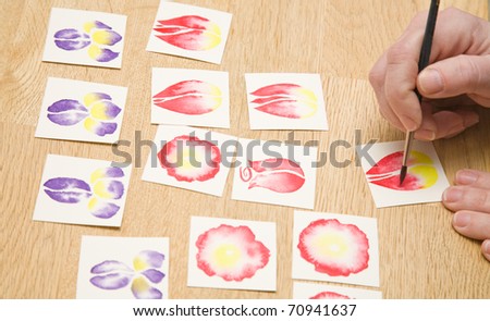 cardmaking in progress - painting square floral miniatures on watercolor paper;