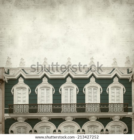 textured old paper background with ornate facades of Triana, shopping street in Las Palmas Gran Canaria
