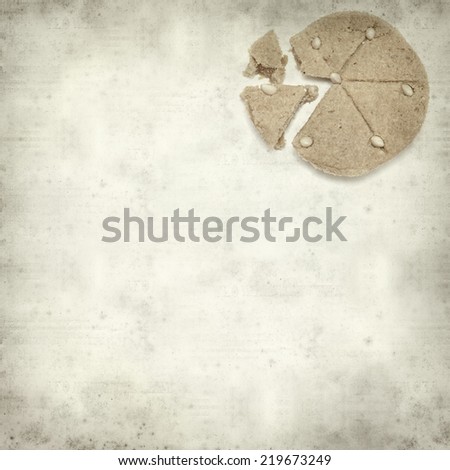 textured old paper background with soft marzipan cake
