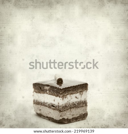 textured old paper background with layer chocolate cake