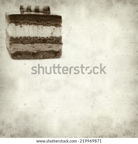 textured old paper background with layer chocolate cake