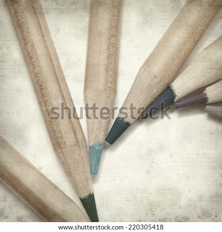 textured old paper background with color pencils