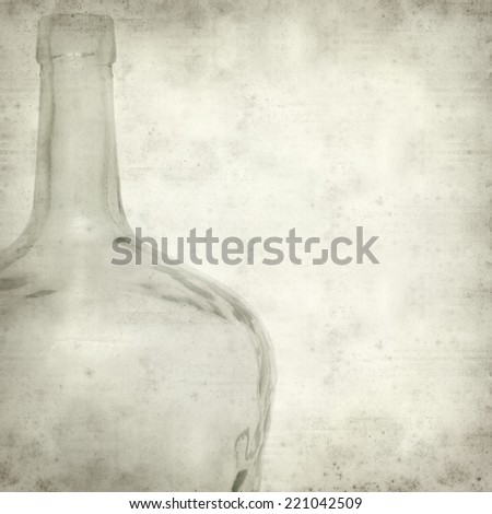 textured old paper background with old glass bottle
