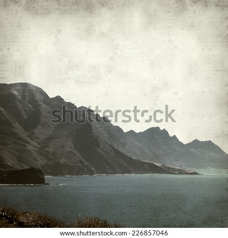 textured old paper background with mountains of Gran Canaria