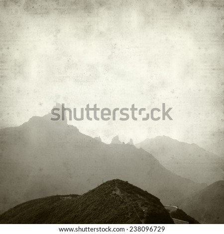 textured old paper background with mountains of central Gran Canaria
