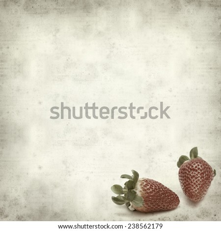 textured old paper background with strawberry