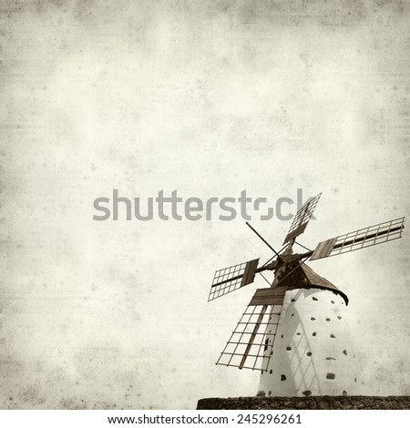 textured old paper background with traditional round windmill, molino, of Fuerteventura