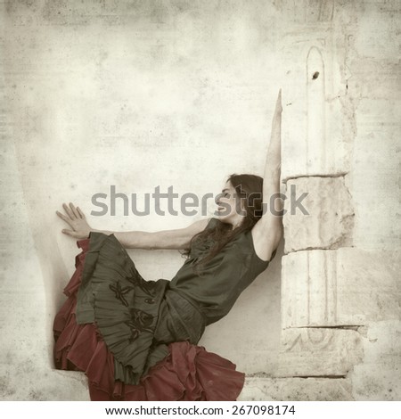 textured old paper background with flamenco dancer in a ruins of old church