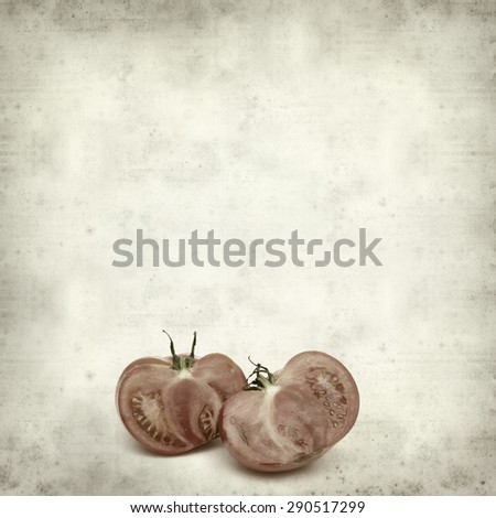 textured old paper background with large tomatoes