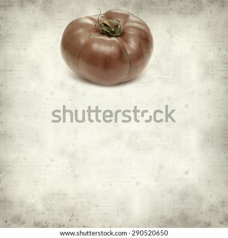 textured old paper background with large tomatoes